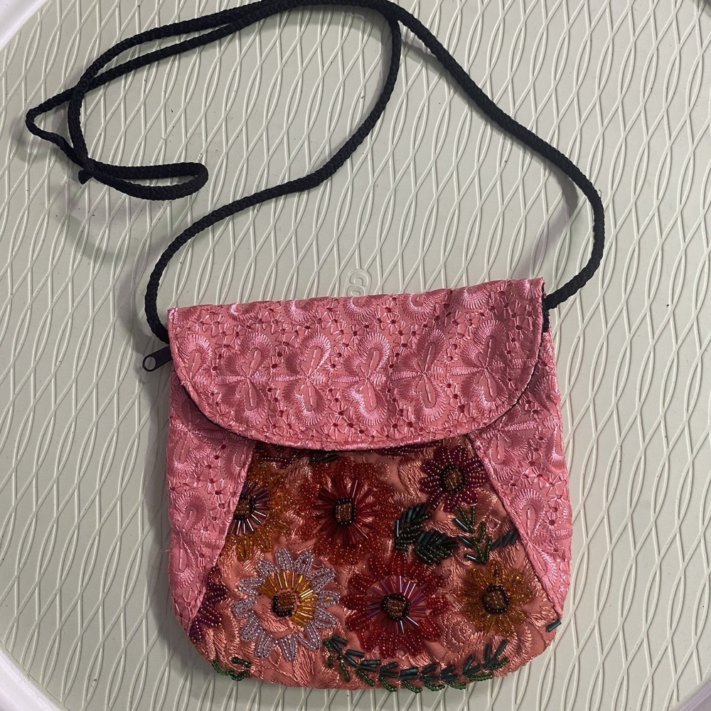 Mini Beaded Purse with Green/orange. zipper At top. black lining 6.5x6.5x1/2"